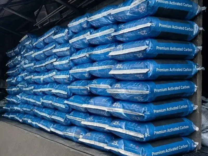 Sealed 25 kg sacks of activated carbon stacked for dispatch